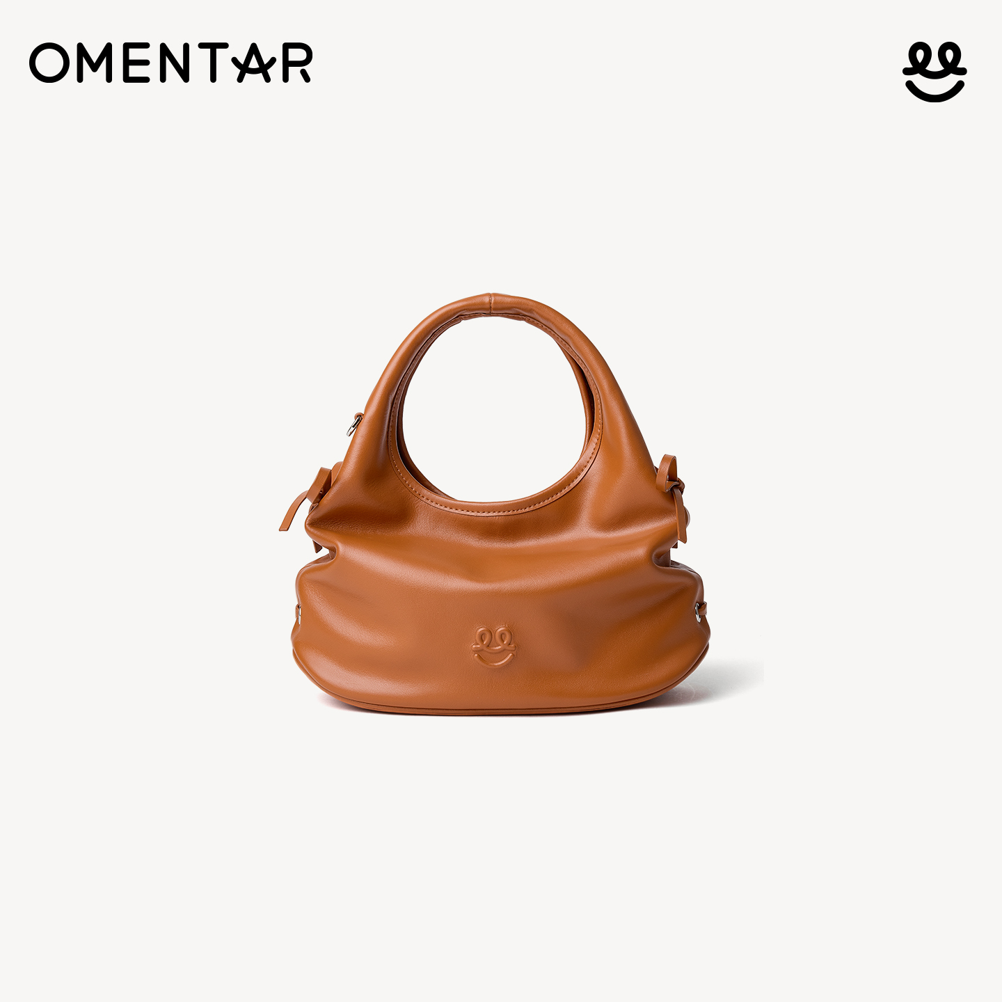 OMENTAR欧蒙特笑脸三角包女小众真皮新款通勤手提单肩斜挎手机包