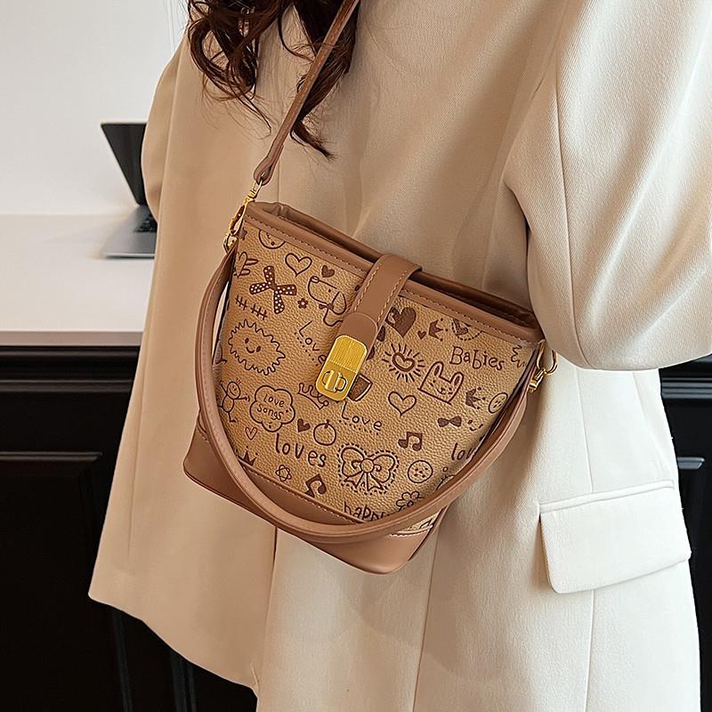 Lee vsasi春夏小包包2025时尚卡通手提水桶包洋气质感通勤斜挎包