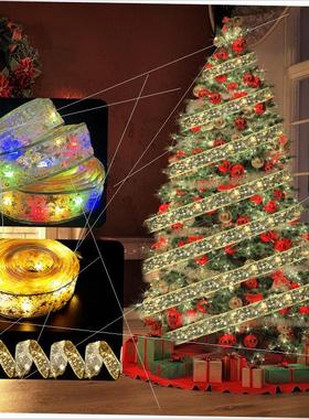 Christmas ribbon lights strung with Christmas tree ribbons