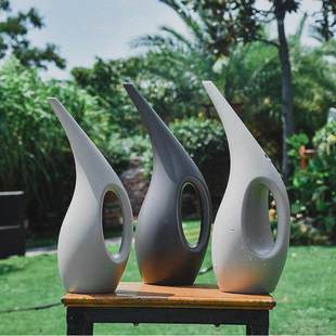 Creative plastic watering pot with long spout for home garde