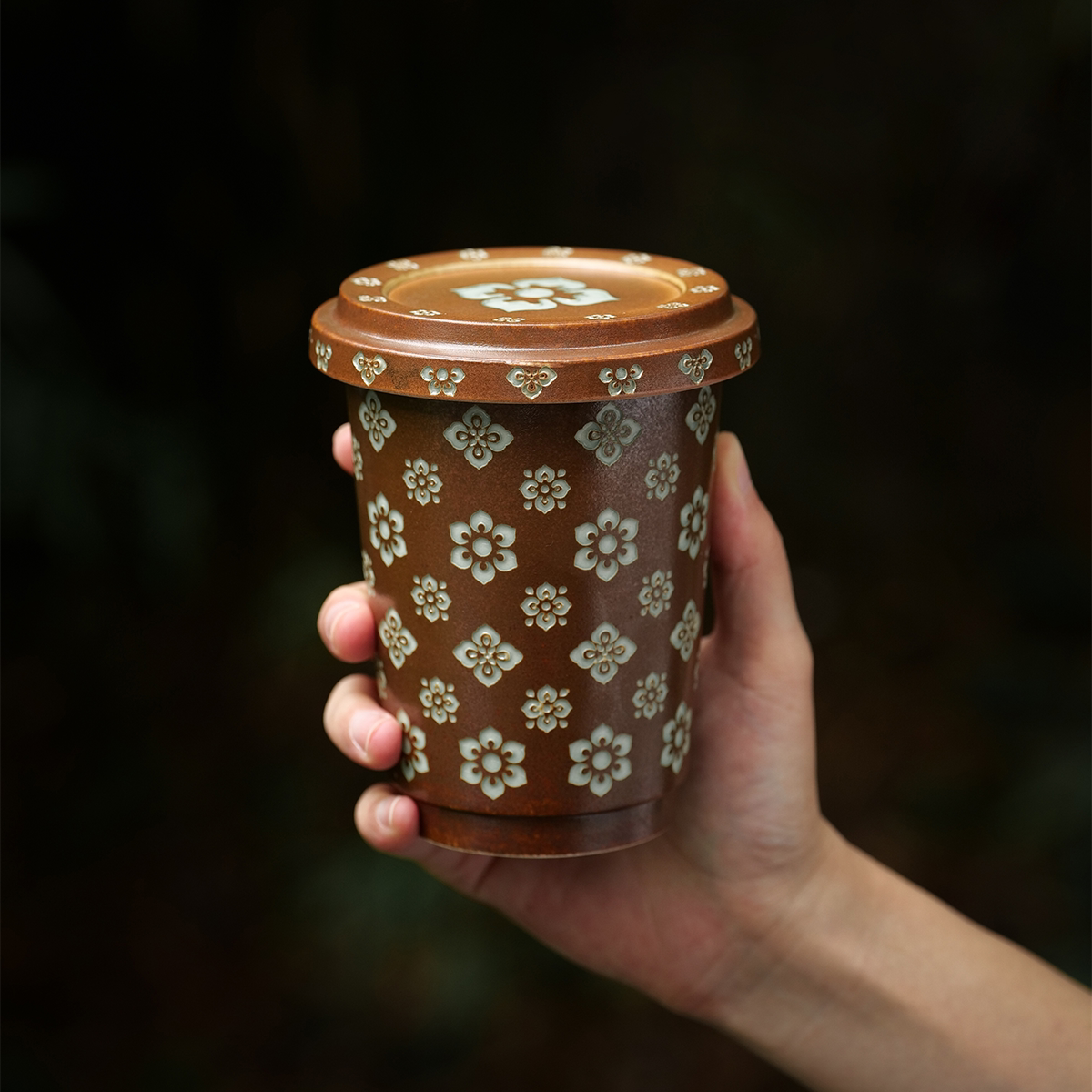 西泠印社龙泉青瓷宝相花茶杯图片