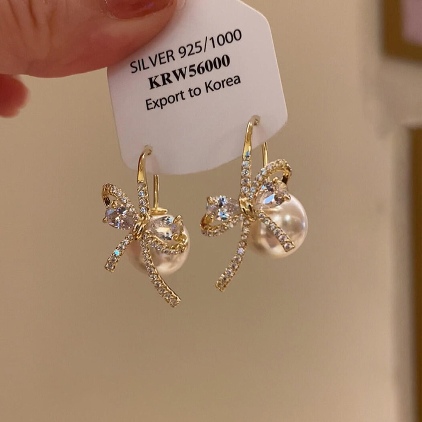 法式爆闪金色蝴蝶结仿珍珠耳环2025新款爆款高级感轻奢秋冬耳饰女,饰品/流行首饰/时尚饰品新,耳环,淘宝优惠券,粉丝福利购,淘宝优惠卷