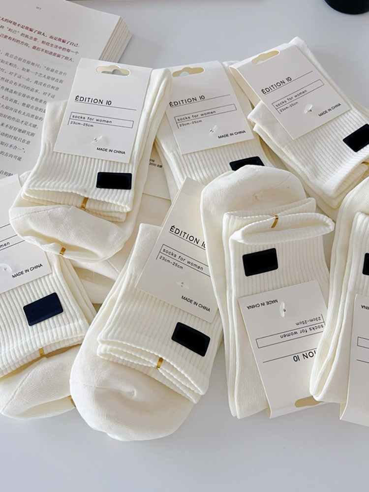 黑白纯色袜子女中筒百搭日系男女学生运动棉袜学院风ins潮情侣袜