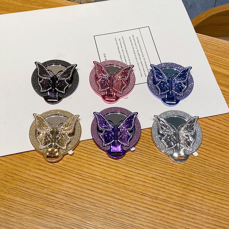 新款闪粉化妆镜蝴蝶手机支架粘贴式磁吸充电折叠桌面支撑追剧便捷