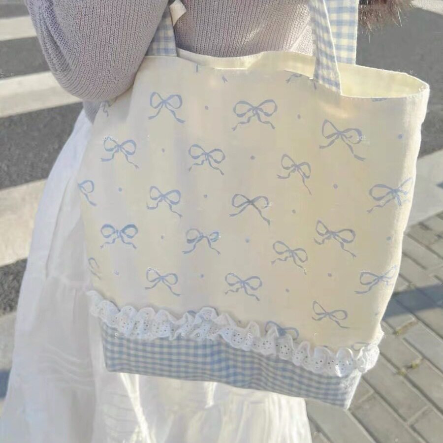 韩系少女蝴蝶结帆布包夏季小清新手提单肩包大容量百搭格子通勤包