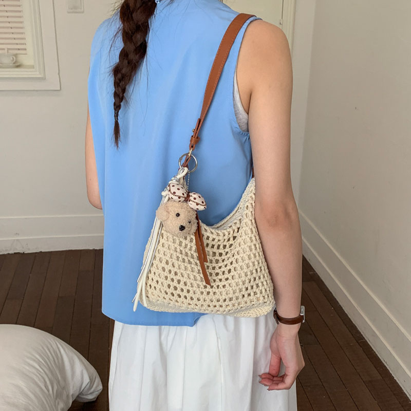 夏天手工编织包包女2026新款潮时尚镂空海边度假斜挎包单肩腋下包