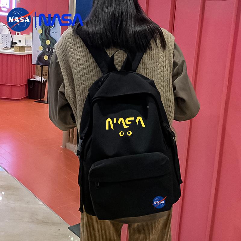 奥莱NASA联名书包韩版大容量轻便减负背包大肩学生简约高初中学生