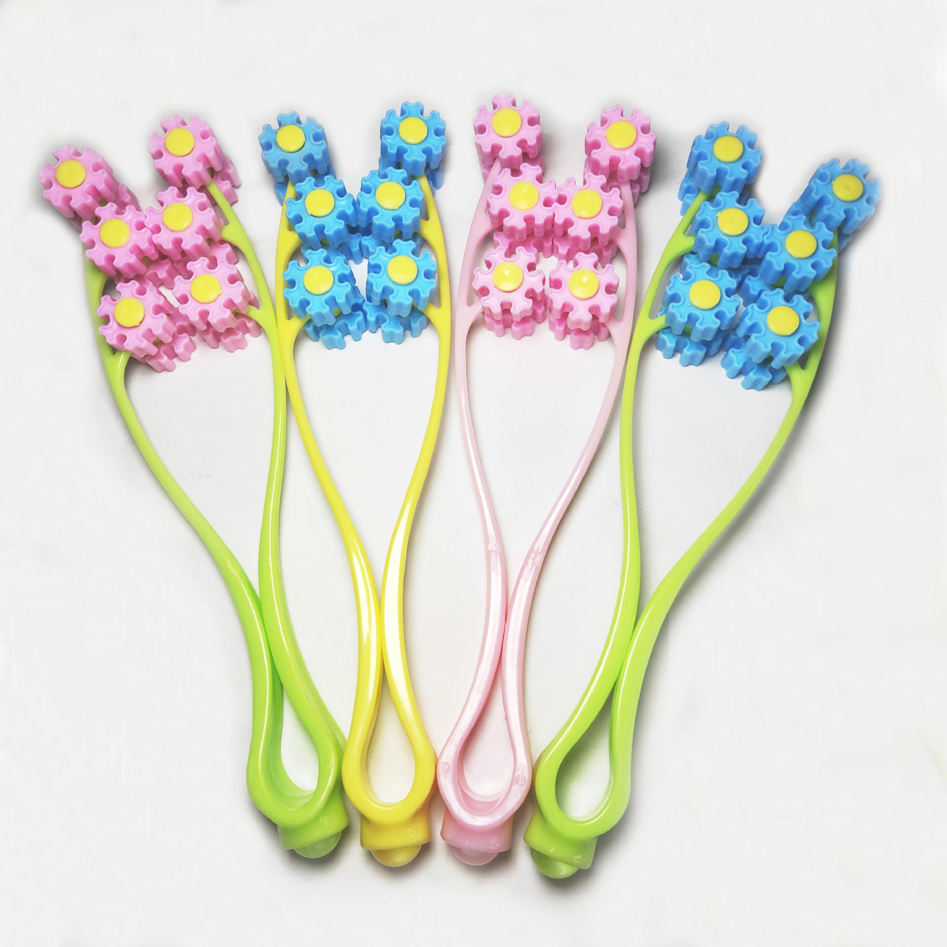 新款小型脸部滚轮按摩器亲肤按摩仪面部按摩器滚珠夹脸器