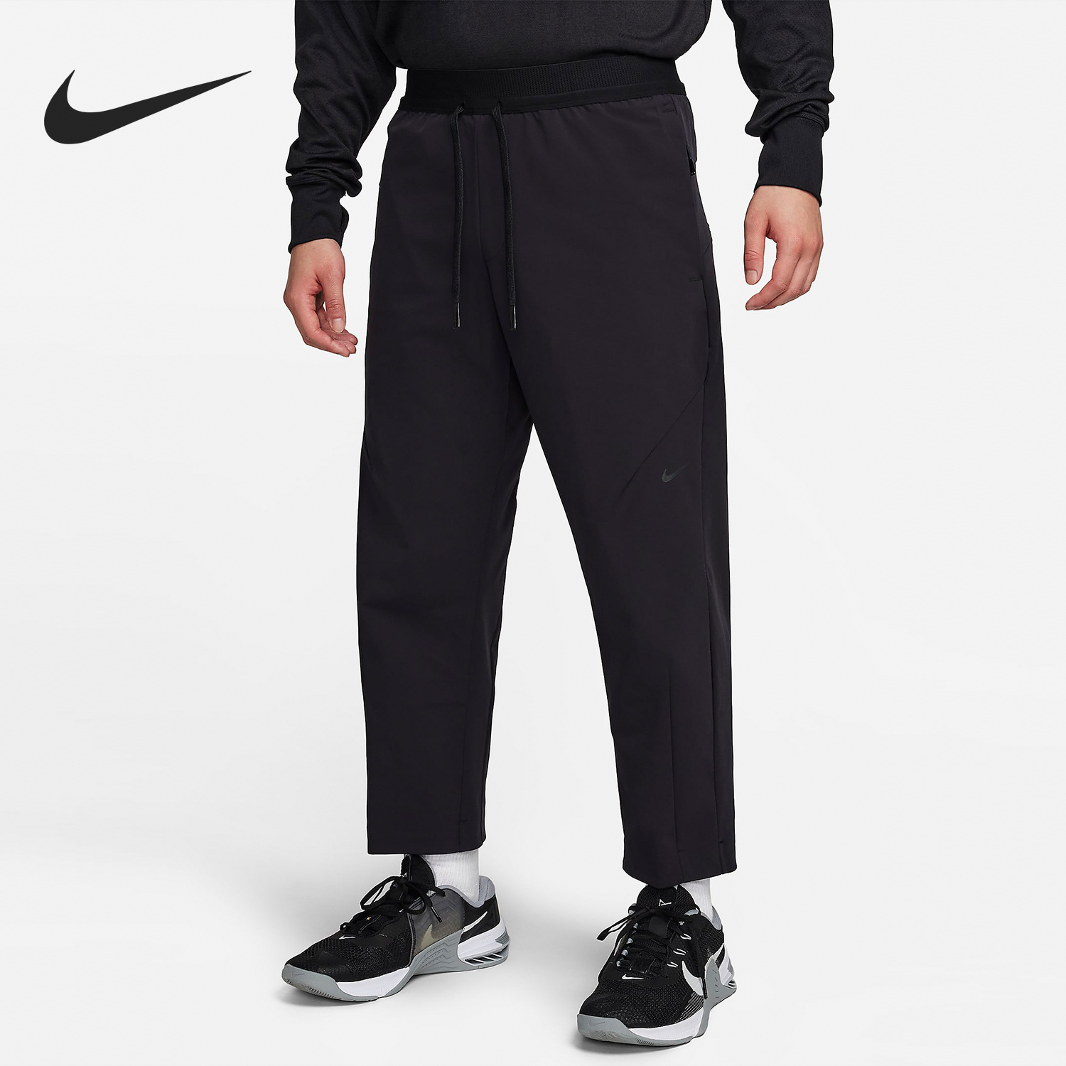 Nike/耐克正品新款男士宽松简约休闲运动梭织长裤FN3015-010