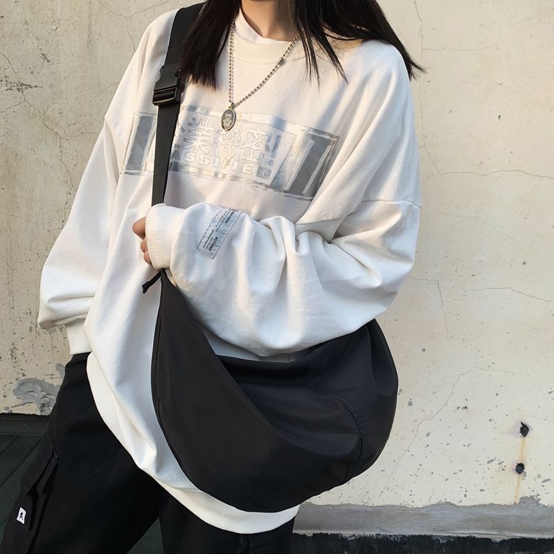 韩版黑色包包女ins学生潮酷简约尼龙防水chic轻便休闲饺子斜挎包