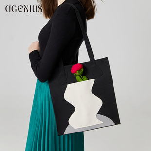 DGENIUS原创托特包包女2026新款编织设计感大容量黑色通勤单肩包