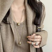 金色水滴钛钢蛇骨项链女秋冬新款 轻奢高级感叠戴气质毛衣链配饰品