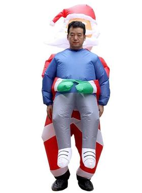 Giant Santa Claus riding reindeer, carrying people inflatabl