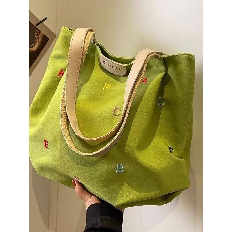 新品大容量帆布包包女2025新款潮刺绣字母手提袋小清新学生单肩托