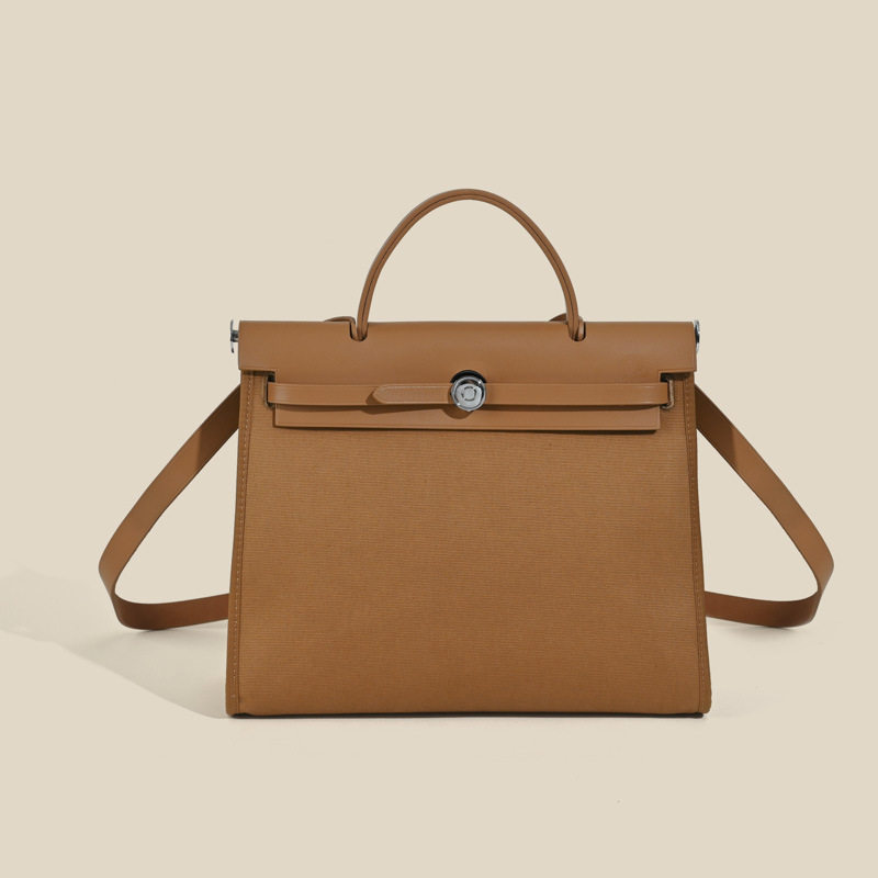 2026百搭时尚潮流包牛皮配帆布高级感通勤百搭包单肩手提斜挎包女