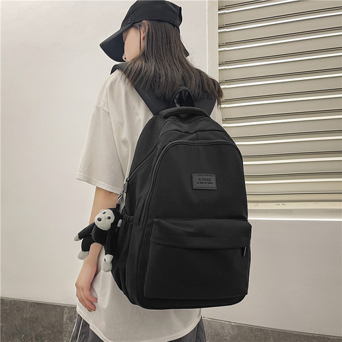 韩版简约纯色系大容量双肩背包