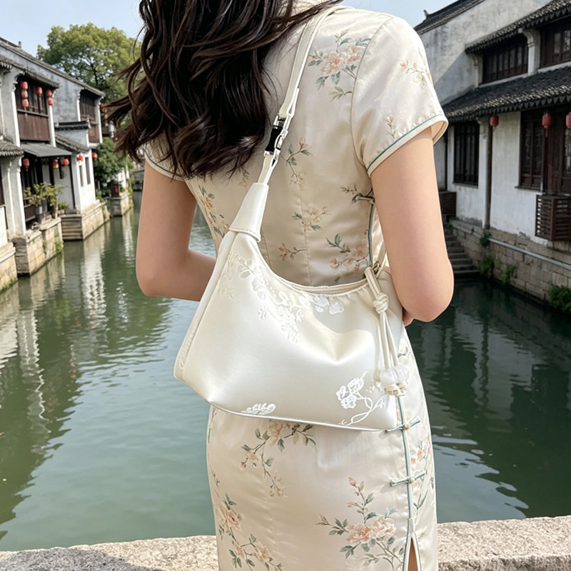 新中式国风宋锦手提包包女2026新款小众设计洋气饺子包旗袍斜挎包