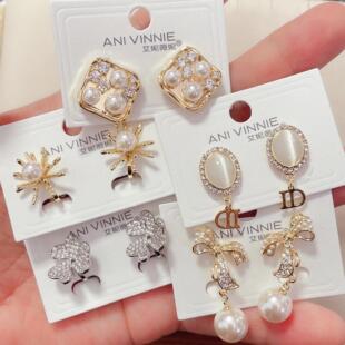 艾妮薇妮耳饰新款微镶锆石猫眼石珍珠花朵蝴蝶结时尚耳夹女无耳洞
