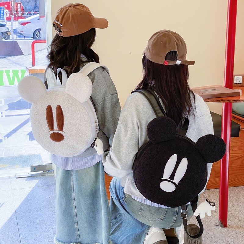 韩版可爱卡通双肩包2026新款少女休闲百搭毛绒背包儿童学生书包潮
