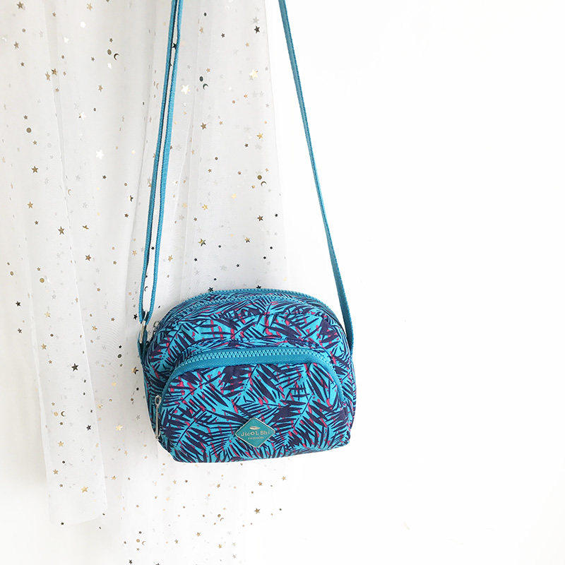 中年妈妈女士小布包零钱包斜挎手机包帆布迷你2025新款牛津布单肩