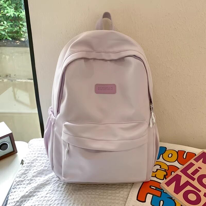 书包双肩包女大学生简约百搭ins背包高中女生大容量可放电脑紫色