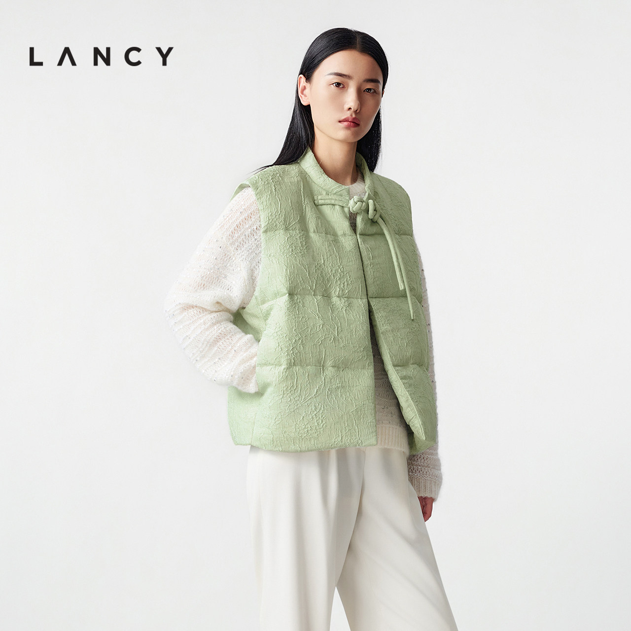 短款无袖 立领盘扣 提花纹理