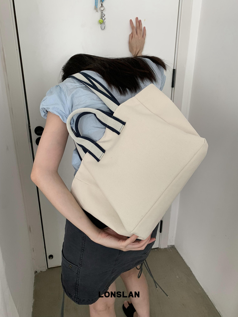Lonslan BAG 2024简约便携大容量通勤可斜挎帆布包黑白手提包,箱包皮具/热销女包/男包,通用款女包,淘宝优惠券,粉丝福利购,淘宝优惠卷