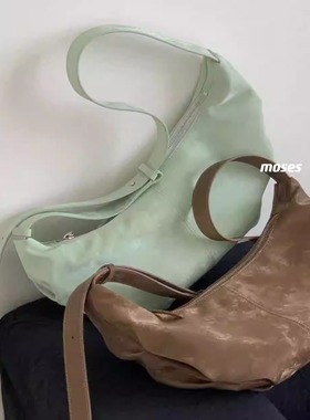 摩西奶奶牛角包绸缎牛皮单肩斜挎包通勤百搭极简包2025新款饺子包