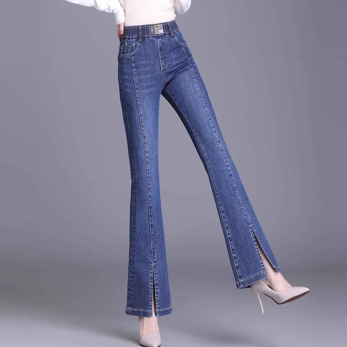 松紧腰显瘦前开叉牛仔微喇裤女士春秋装2025新款高腰宽松喇叭长裤