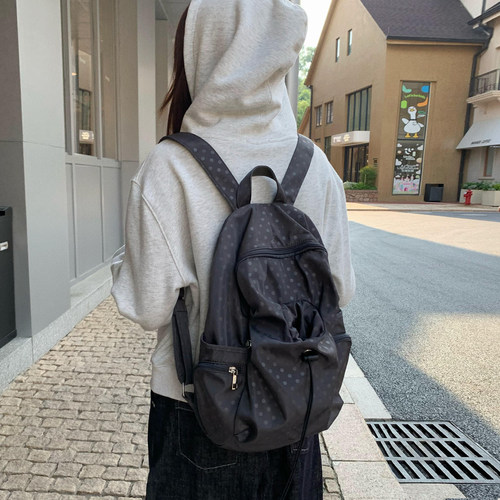 波点多口袋书包女休闲学院风背包