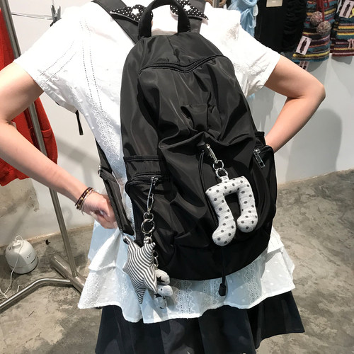 Uniqueblue韩版纯色书包尼龙防水背包学生旅游轻便洞洞抽绳双肩包