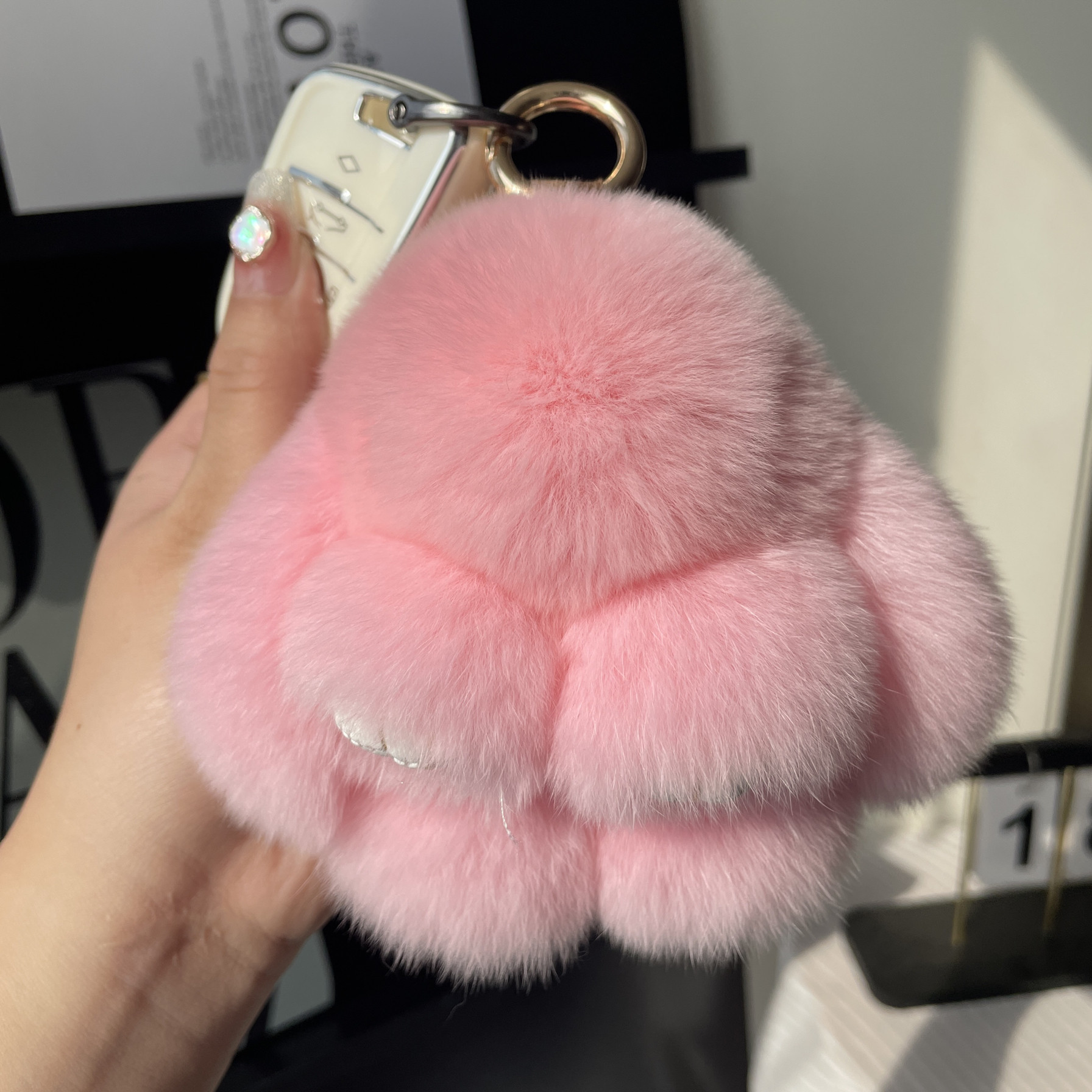 真獭兔毛公仔礼物可爱包包挂饰