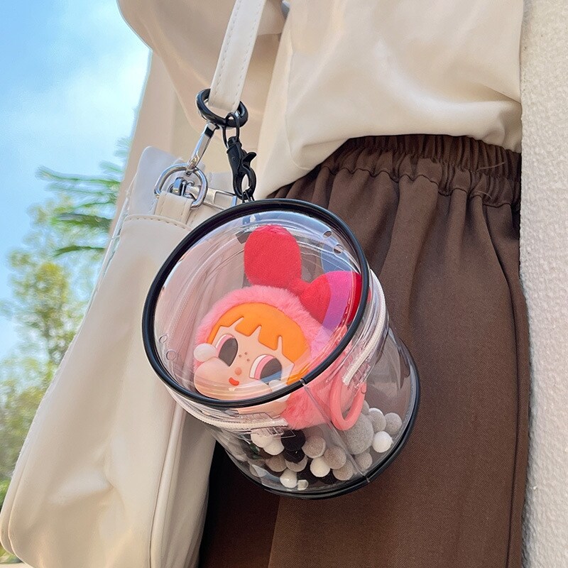 泡泡玛特哭娃飞天小女警盲盒 遛娃包棉花娃娃收纳晒娃包挂件透明图片