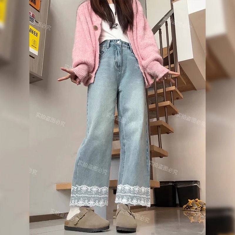 浅蓝色九分蕾丝拼接牛仔裤女
