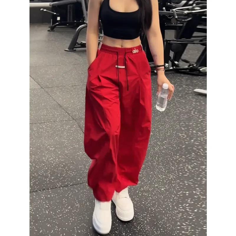 北木服饰男女同款冲孔透气户外运动裤撞色拼接薄款宽松弯刀休闲裤