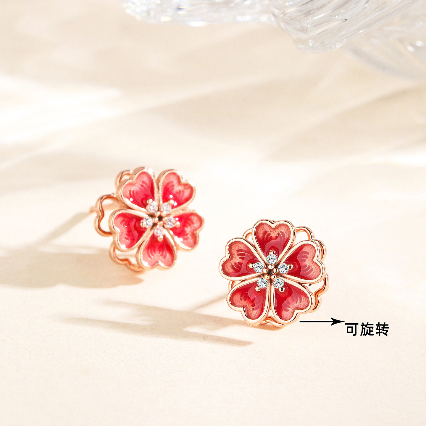 s925纯银旋转桃花耳钉得物同款