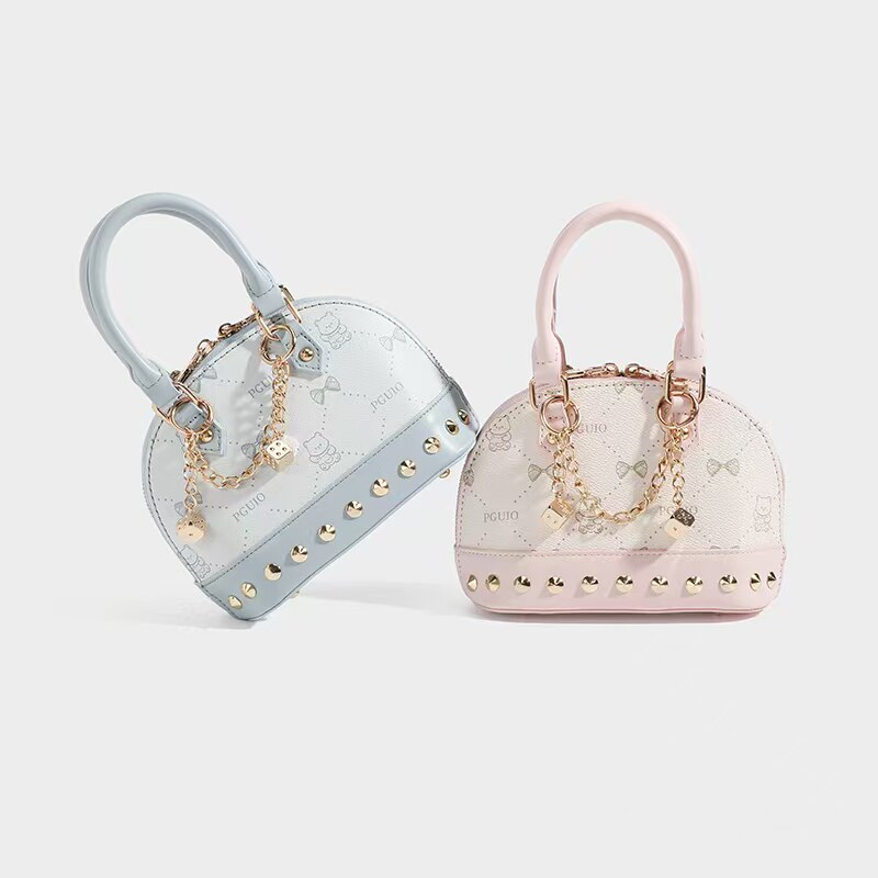2026年新款欧美小众设计高级感香槟千金铆钉手提贝壳小包时髦单肩