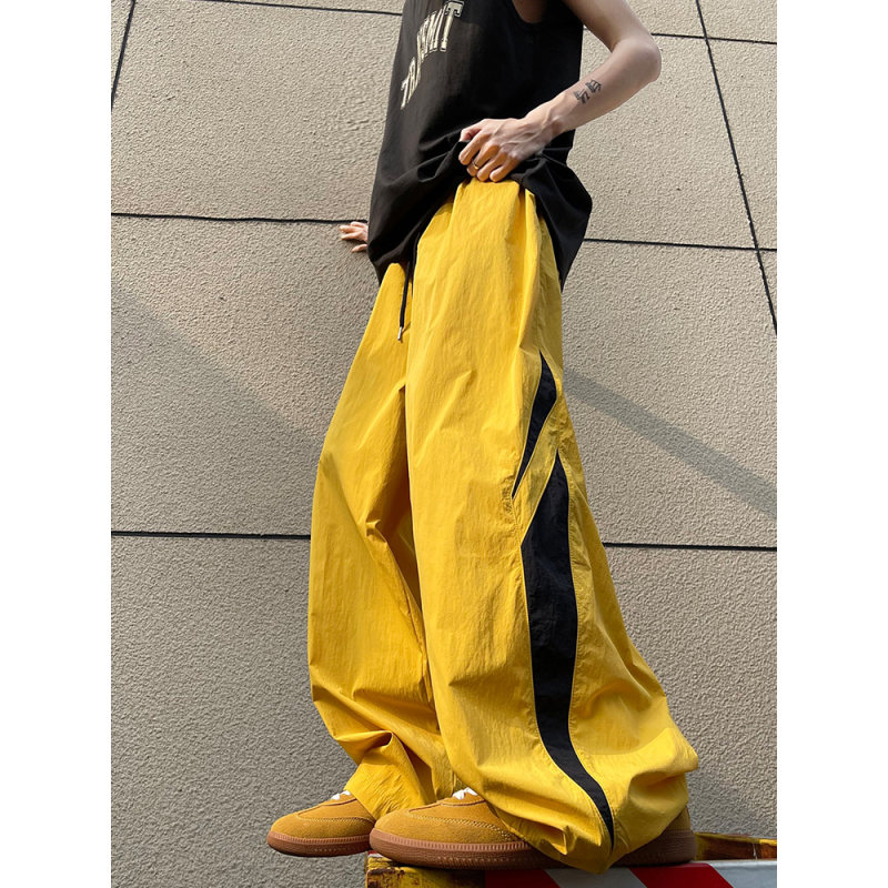 姜黄色拼接伞兵冲锋裤男