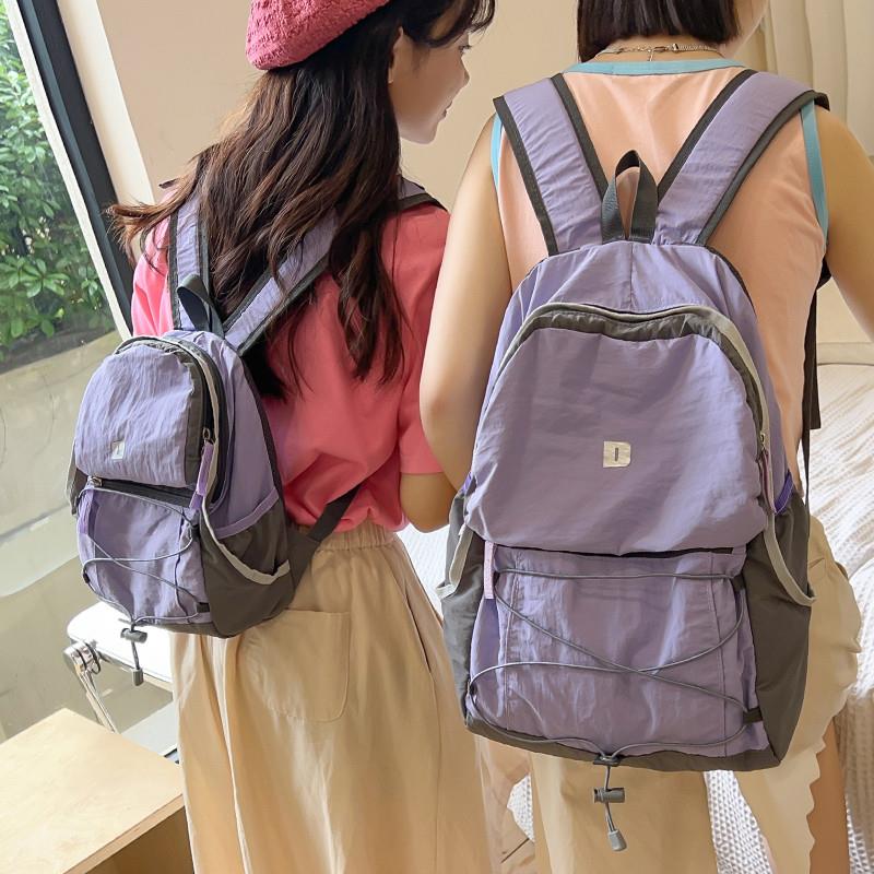 户外运动轻便双肩包女学生书包新款骑行包野餐露营旅游背包登山包