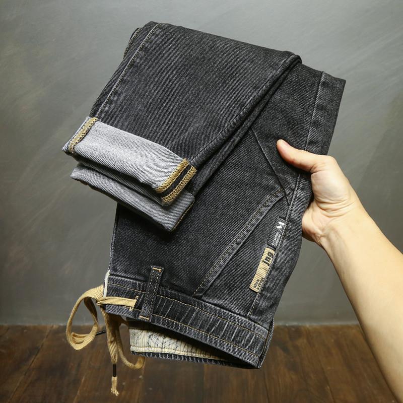 秋冬厚款松紧腰抽绳斜口袋哈伦新塘牛仔裤男士宽松直筒高弹力简约