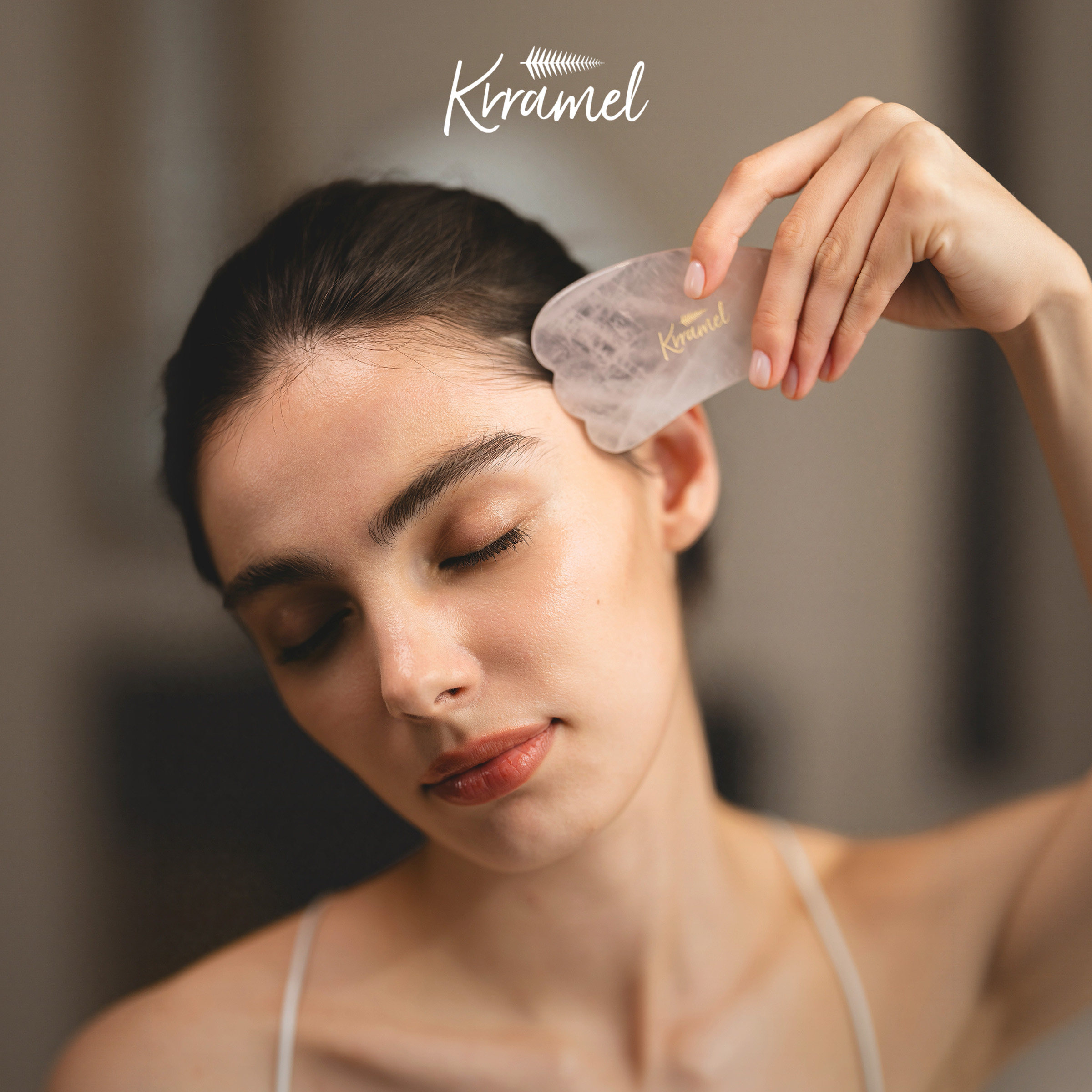 KRRAMELA级粉水晶面部刮痧板按摩图片