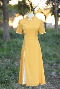 黄色中长款奥黛旗袍2025年新款春夏蚀骨改良版中国风连衣裙年轻款