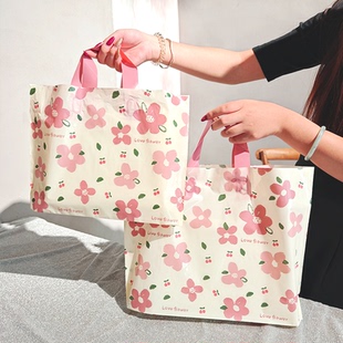 装衣服的塑料袋子服装店手提袋定制logo图案手提袋定做衣服包装袋