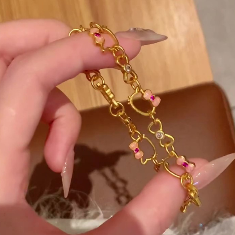 HelloKitty小猫头蝴蝶结手链锆石女甜美高颜值黄金色镂空送闺蜜礼