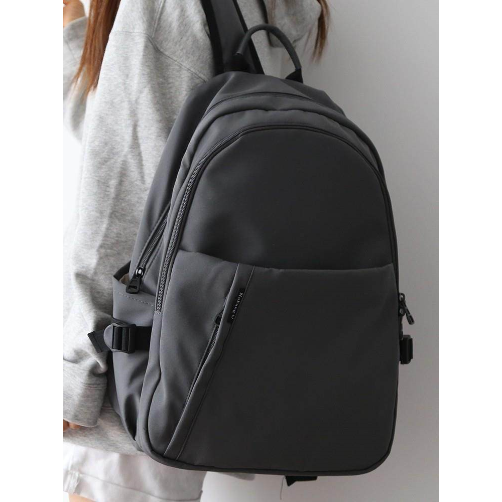 英国 MK DW 黑色书包男大学生中学生双肩包女大容量休闲纯色电脑