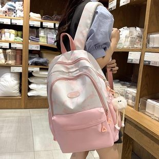 英国 MK DW柜台新型高价值印刷减重护脊书包初中生女大学生双肩包