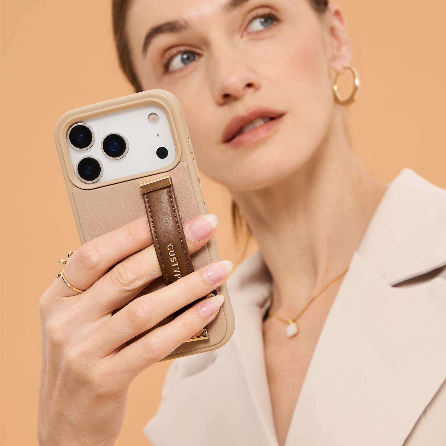 苹果15promax皮质简约手腕支架