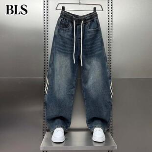 高端加绒水洗牛仔裤男款冬季2025新款美式复古拼接宽松阔腿弯刀裤