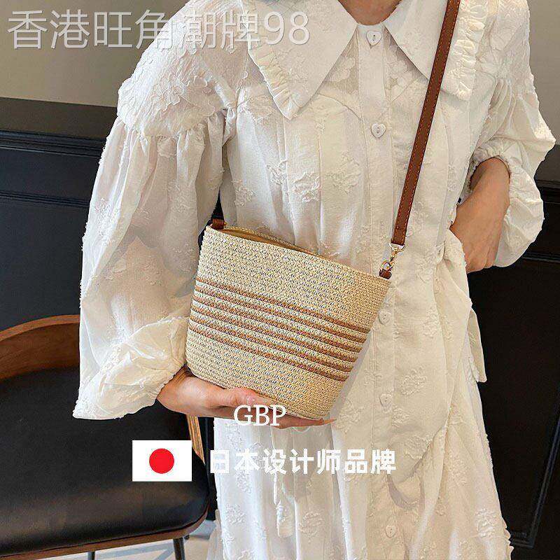 日本ファッションバッグ女包编织水桶包斜挎包休闲海边度假草编包
