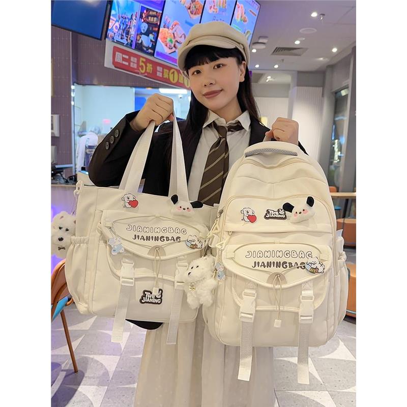 儿童书包手提袋女生小学生一年级初中生背包大学生高中印花双肩包